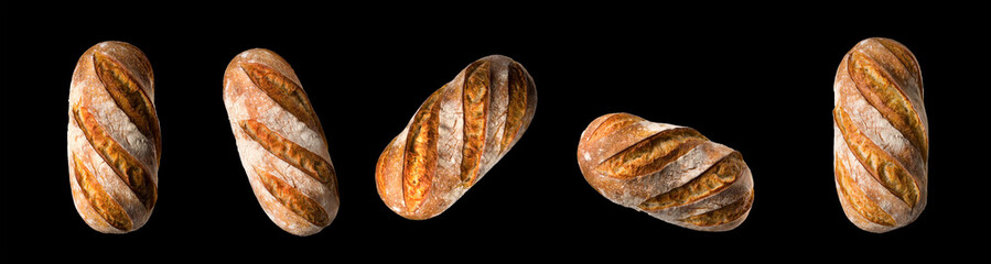 Set of fresh baked bread and French rye baguette isolated on black background