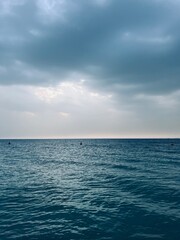 Fototapeta premium cloudy seascape, azure sea horizon