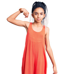 Cute african american girl wearing casual clothes strong person showing arm muscle, confident and proud of power