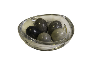 granite eggs in crystal vase