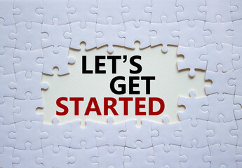 Lets get started symbol. Concept words Lets get started on white puzzle. Beautiful white...