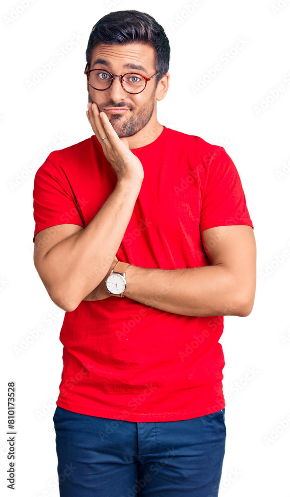 Sticker young hispanic man wearing casual clothes and glasses thinking looking tired and bored with depressi