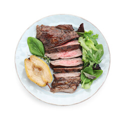Pieces of delicious roasted beef meat, caramelized pear and greens isolated on white, top view