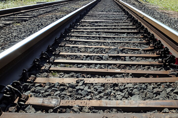 Railway. Railroad tracks. Railway tracks in a sunny day, close-up view. Switch on train tracks. Old railway view.