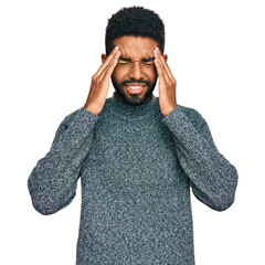 Young african american man wearing casual clothes with hand on head for pain in head because...