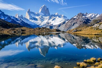 A tranquil mountain lake surrounded by snow-capped peaks, reflected in the mirror-like surface of the water, with a sense of serenity in the air