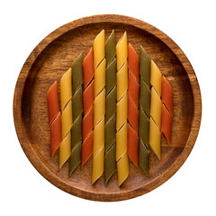 Mezze penne tricolore pasta on a wooden plate, shot in high key, on a white background.