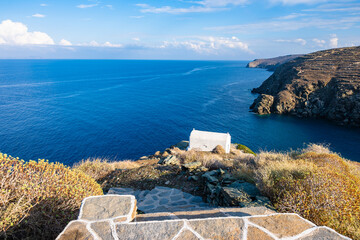 Path with steps to small chapel on sea coast in Kastro village, Sifnos island, Greece