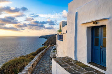 Sunrise over sea and view of white houses in Kastro village, Sifnos island, Greece