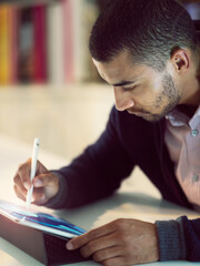 Man, tablet and digital drawing in office for work as graphic designer or web development for agency. Employee, creative and sketch pad for designing brand logo, website app and storyboard prototype.