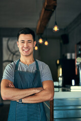 Cafe, portrait and happy business owner with pride in hospitality, service or waiter with arms...