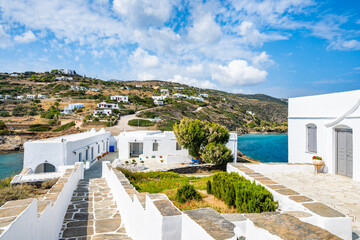 View of famous Chrysopigi monastery buildings and green hills, Sifnos island, Greece