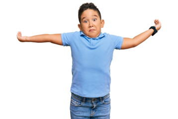 Little boy hispanic kid wearing casual clothes smiling showing both hands open palms, presenting and advertising comparison and balance