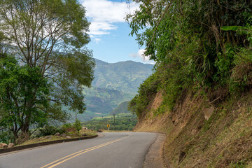 Curve between a road between the mountains in a Colombian landscape