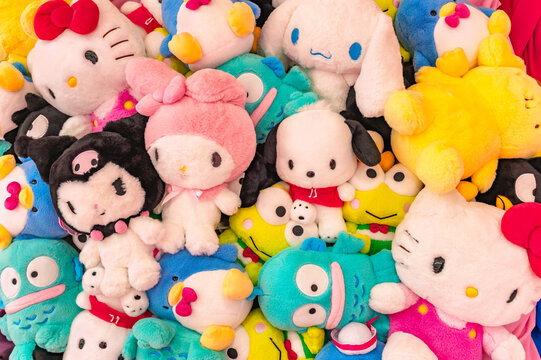 tokyo, japan - apr 16 2024: Bunch of multi-colored plushies of Sanrio characters like Hello kitty, Cinnamoroll, Pompompurin, Kuromi, Pochacco, My Melody, Hangyodon, Tuxedo Sam, Keroppi or Badtz Maru.