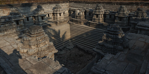 Fototapeta premium Kalyani Pushkarini or Hulikere Pushkarani is a beautiful sacred pond located in the small village of Hulikere. Halebidu. India