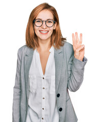 Young caucasian woman wearing business style and glasses showing and pointing up with fingers number three while smiling confident and happy.