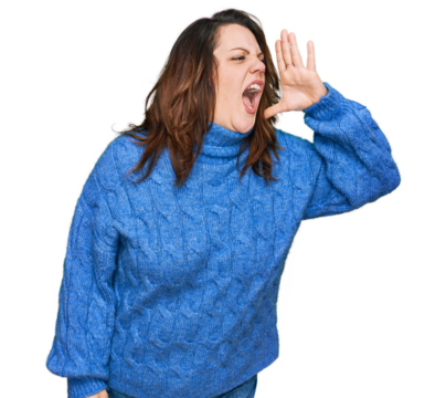 Young plus size woman wearing casual clothes shouting and screaming loud to side with hand on mouth. communication concept. - Powered by Adobe
