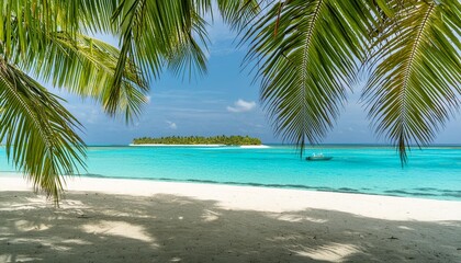 view through palm trees to a dream beach in the maldives with the turquoise blue waters of the ocean