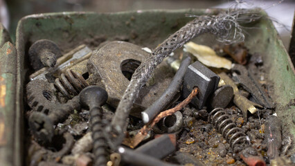 there is a pile of used spare parts lying around in the garage