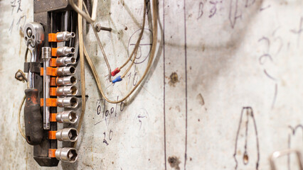 a wall with many tools in the workshop
