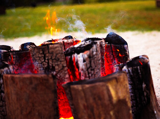 burning match in the fireplace