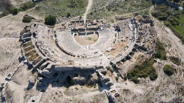 Footage of historical ruins, columns, ancient theater and temples in the ancient city of Miletus.