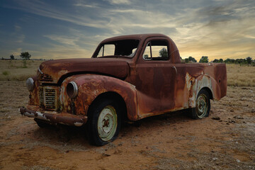 Old Scrap Cars found in the outback sunset sky