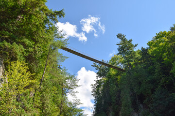Looking up at suspension bridge at Canyon Sainte Anne in Quebec Canada