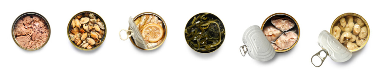 Set of delicious canned seafood on white background, top view