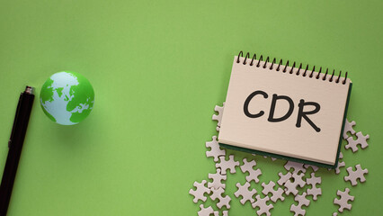 There is notebook with the word CDR. It is an abbreviation for Carbon Dioxide Removal as eye-catching image.
