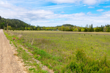 A dirt road through the rural countryside of Newport, Washington, USA, in the Northeastern corner of Washington State near the city of Spokane.