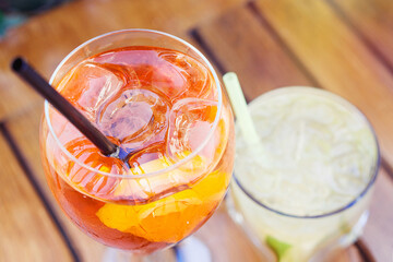 Refreshing aperol spritz and lemonade on a sunny day