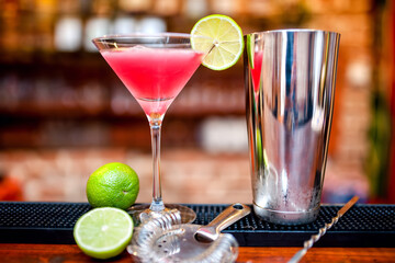 Refreshing cosmopolitan cocktail on bar counter