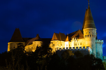Naklejka premium Photo of Corvin Castle which is histirical landmark on sunset of Romania.