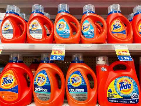 Los Angeles, California &ndash; May 9, 2024: TIDE Detergent bottles on a shelf in a supermarket. Tide is a laundry detergent manufactured by Procter and Gamble