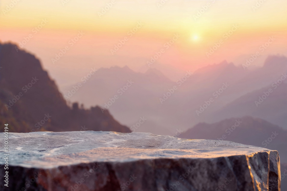 Aufkleber sunset casting a warm glow on a rocky with a view of layered mountain ranges. high quality photo