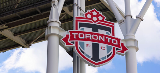 Naklejka premium FC Toronto the soccer club at exhibition place with BMO field - TORONTO, CANADA NORTH AMERICA - APRIL 18, 2024