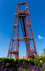 Metal construction of Vizcaya Bridge over Nervion river in Spanish city of Portugalete ..