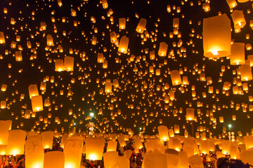 Enchanting sky full of floating lanterns at night