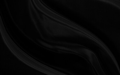 Black gray satin dark fabric texture luxurious shiny that is abstract silk cloth background with patterns soft waves blur beautiful.