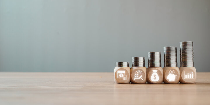 Payroll concept, Wooden block on desk with payroll icon on virtual screen.
