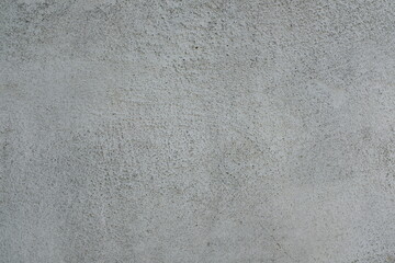 course gray concrete wall , consistent color, for texture background
