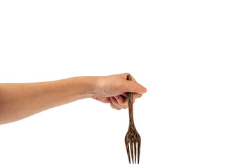 Hand and wooden fork on transparent background