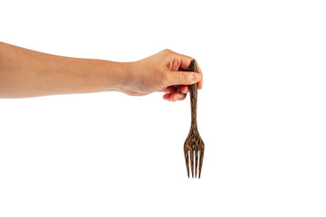 Hand and wooden fork on transparent background