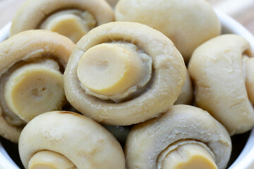 Champignon mushrooms in brine. Canned champignon mushrooms whole
