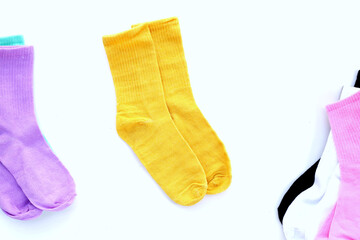 Colorful socks on white background.