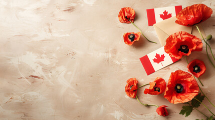 Poppy flowers with flags of Canada and card on beige white