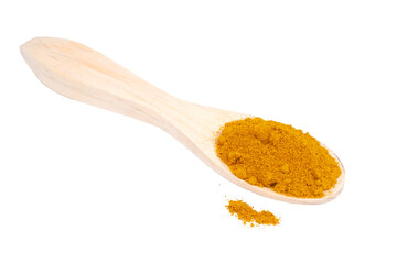 organic curcuma powder in a wooden spoon isolated transparent