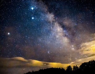 Fototapeta premium starry night sky A celestial spectacle unfolds overhead, as the night sky comes alive with a dazzling display of stars and constellations,